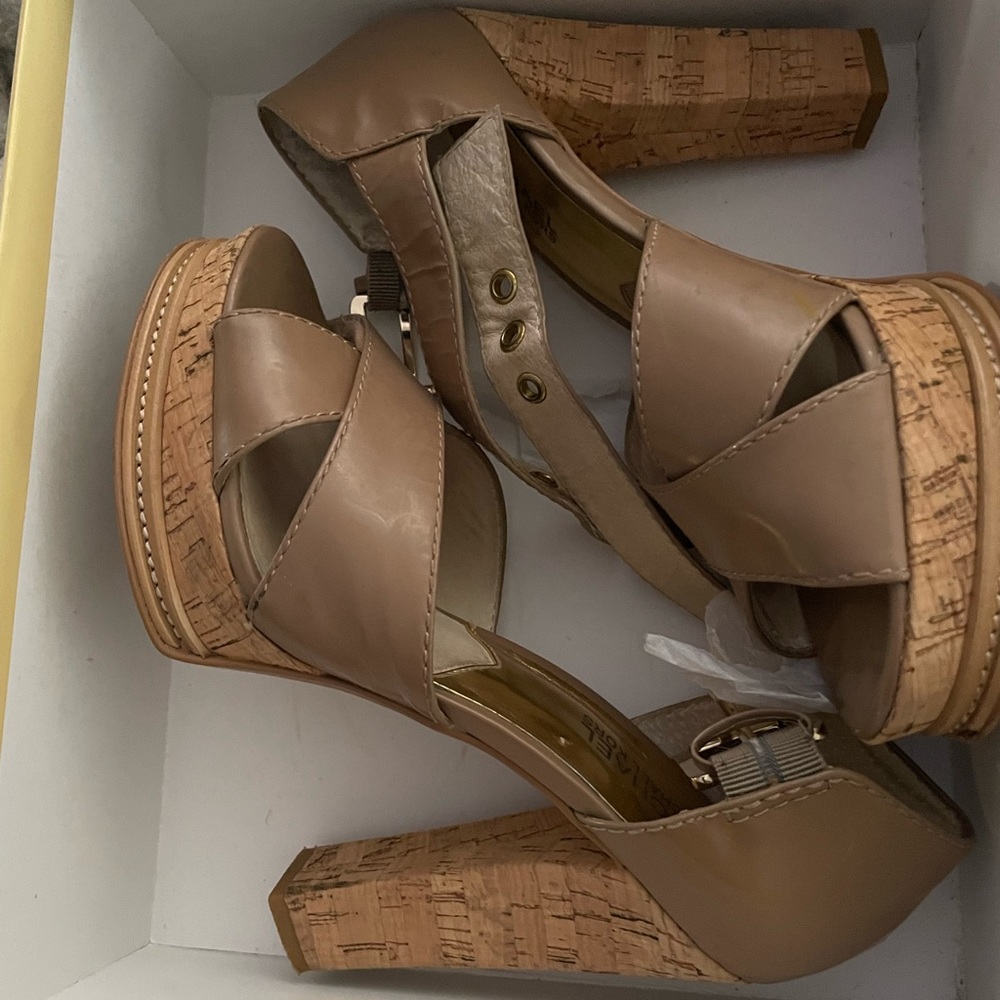 These are Michael Kors wedges. They are brand new. They have never been worn!